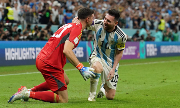 Emiliano Martinez and Messi